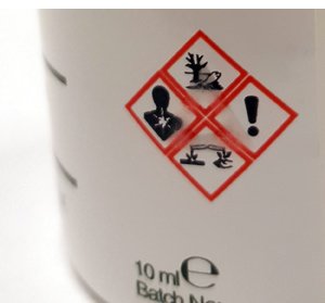 Tactile hazard warning labels