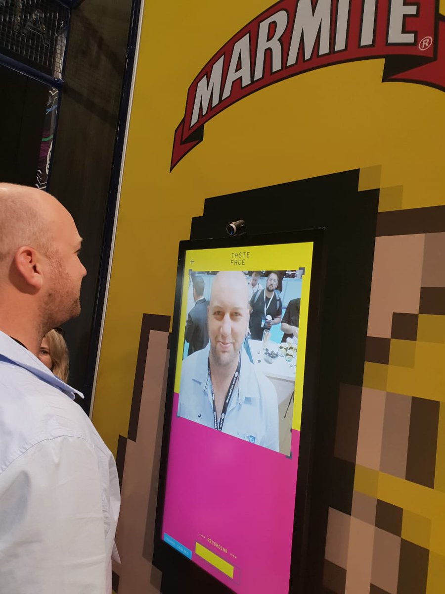 higuruchat's tweet photo. Who said #AI couldn't be used for fun? Our VP of Engineering at @higuruchat , @CharlGreeff enjoying @Microsoft's facial recognition booth that determines whether you're a Marmite lover or hater. What's the verdict?
#AISummit #higuru #engineershavingfun https://t.co/7avN9ltsz7