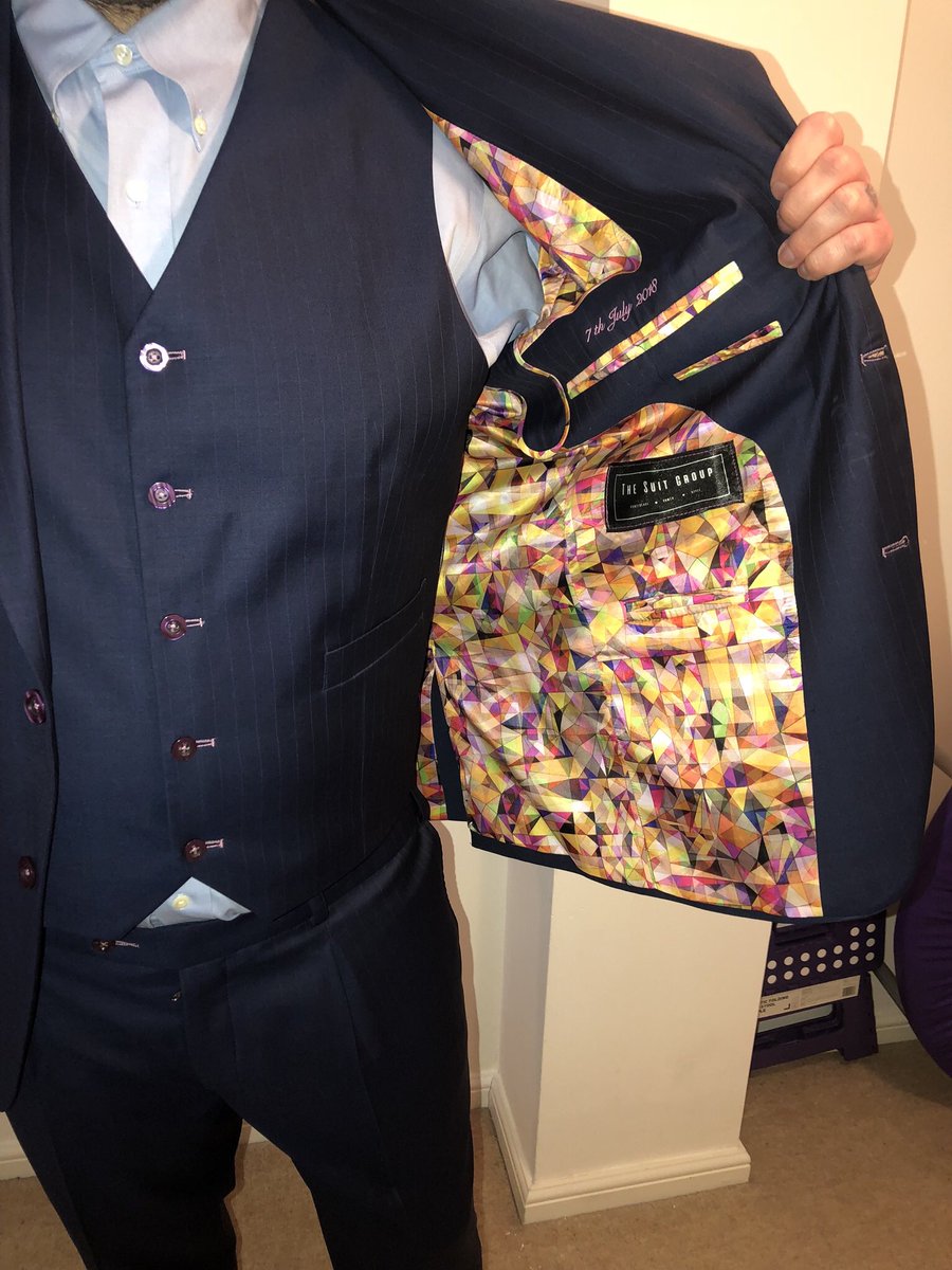 TheSuitGroup's tweet photo. Our first completed wedding suit 👌🏾 A Purple Pinstriped Navy 3 piece made from S140 wool. Wedding date embroidered inside the jacket. Our client is extremely happy with the fit and experience of having their first tailored suit made for them 🙌🏾 https://t.co/m6y7AYCqkh