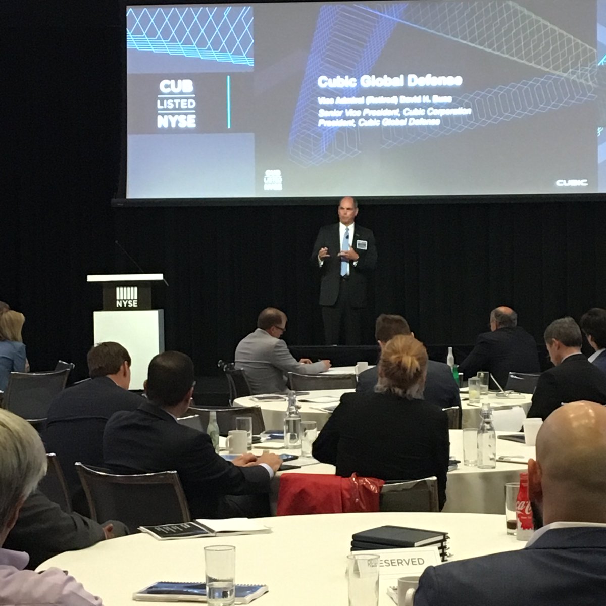 CubicCorp's tweet photo. Dave Buss, President of @CubicDefense, telling the #NextTraining strategy story at our Analyst &amp; #InvestorDay @nyse. We are all in. #WeAreCubic #InvestorRelations #groundcombattraining #maritime #nationalsecurity #cybersecurity #SOF #specialops https://t.co/loTVC3JxOP https://t.co/VFqvNfvkNc