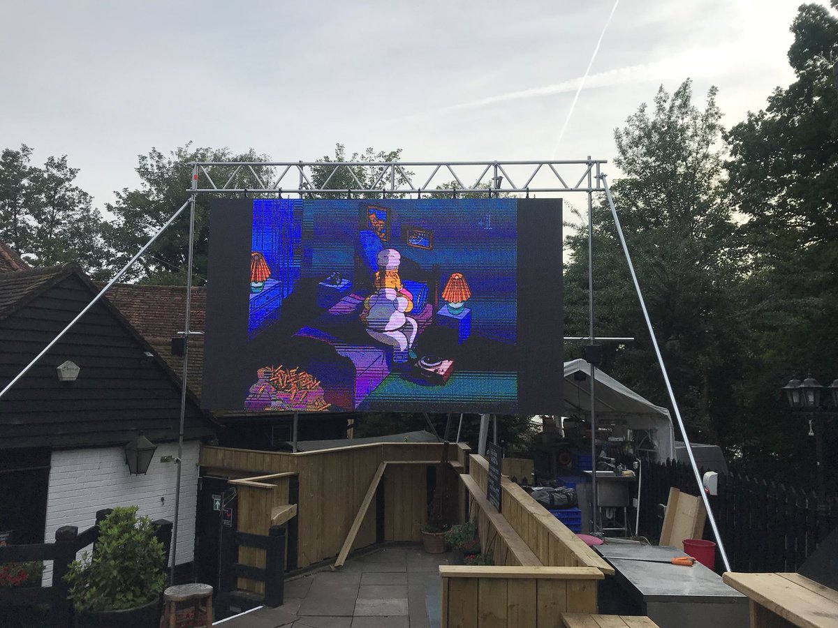 mattbigg's tweet image. If you are thinking of watching the World Cup. 

In a pub. 

In St Albans. 

Can I recommend the @FightingCocksSA 

This the screen in the garden. Amazing.