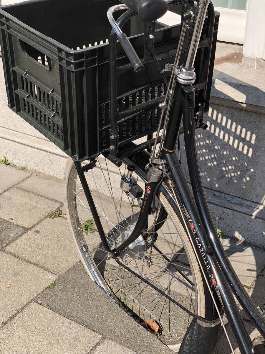 Bike parking. Built right into the sidewalk. Invisible until you need it.