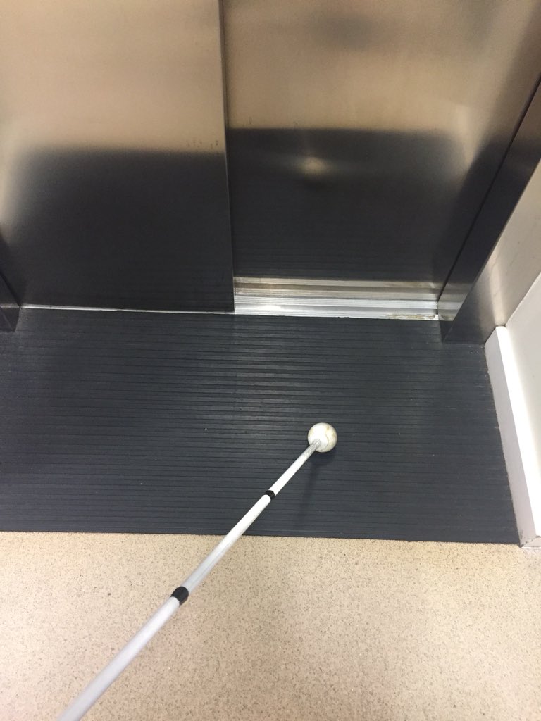 At my office we also have an indoor version of the striped tactile in front of lifts!