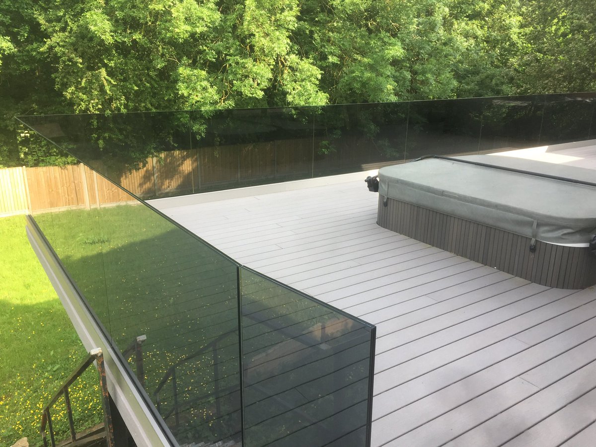 GmrAluminium's tweet photo. Frameless glass balustrade with grey tint glass fitted on this impressive decking area!! https://t.co/dwQh7NjDPG