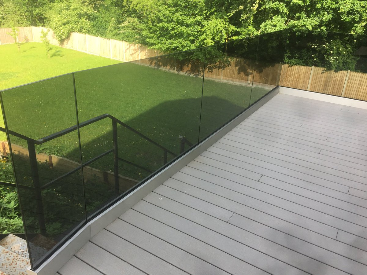 GmrAluminium's tweet photo. Frameless glass balustrade with grey tint glass fitted on this impressive decking area!! https://t.co/dwQh7NjDPG