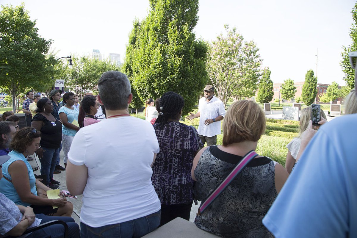 TulsaSchools's tweet photo. Nearly 50 Tulsa Public Schools teachers and staff are attending the Tulsa Race Massacre Teacher's Summer Institute this week. On Wednesday, the institute paid a visit to downtown's John Hope Franklin Reconciliation Park. #whatsupwednesday https://t.co/bJbNSU5iZh
