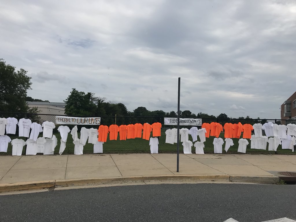 moco4change's tweet photo. The shirts are now at Walter Johnson High School! They will be taken down one week from today, so stop by WJHS before they’re gone. This is the last stop for the school year, but they’ll be back at the start of next year. #MemorialForOurLives https://t.co/vrKRLhlFoN