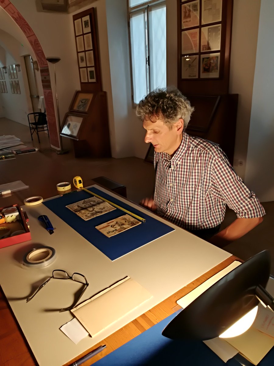 dogheria's tweet photo. #martatwork, ultimi ritocchi in vista dell'opening di #ManuPropria domani a #CasaDepero del @mart_museum. Ecco il collega Prosser alle prese con 2 libri xilografici giapponesi del periodo Edo dell'#Archiviodel900 https://t.co/bsoc4ZJujw