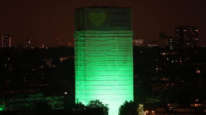 itvnews's tweet photo. Grenfell Tower and other buildings across London illuminated in green overnight to mark the first anniversary of the fire which killed 72 people #GreenForGrenfell 
https://t.co/2etPyRrJC3 https://t.co/V9X7faO1e7