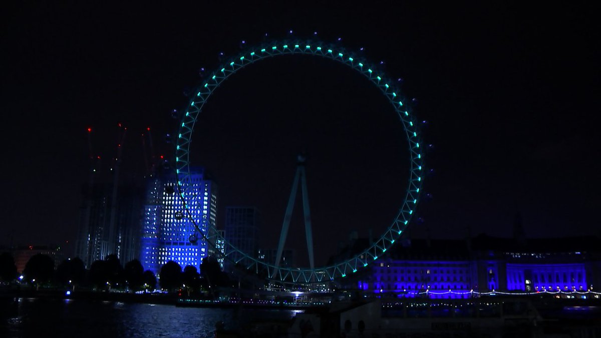 itvnews's tweet photo. Grenfell Tower and other buildings across London illuminated in green overnight to mark the first anniversary of the fire which killed 72 people #GreenForGrenfell 
https://t.co/2etPyRrJC3 https://t.co/V9X7faO1e7