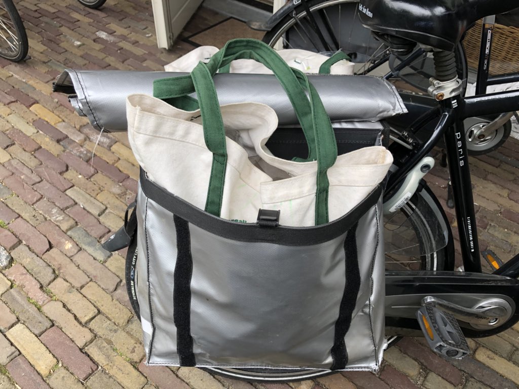 Shopping by bike. Sometimes I bump into people I know while riding to the grocery store. I live nearby so I don’t have to shop for everything at once. If I forget an item in a recipe I go back. Bike parking is in front of the entrance to the store.