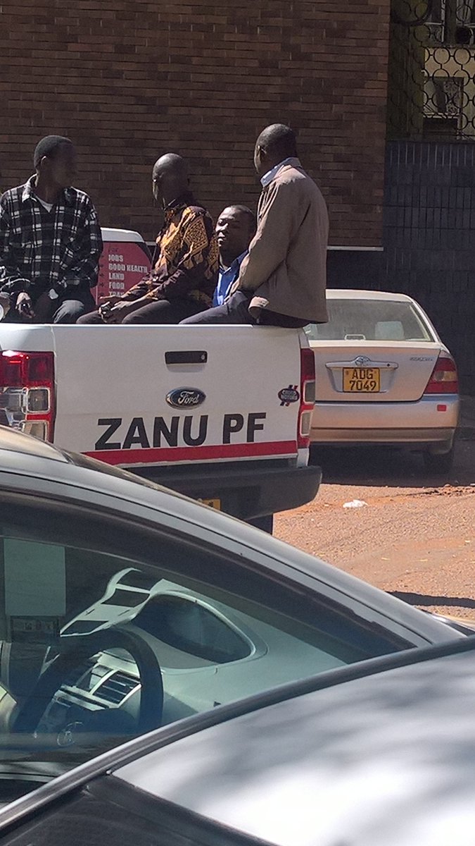 g_nyikadzino's tweet photo. #KudziChipanga talking to @zanu_pf officials after leaving court. Be good to the people on your way up the ladder coz you will need them on your way DOWN! HOW have the #MightyFallen! @HMetro_ @hakulandaba @matigary @munyabless @george_manyonga @henryhakula @Michellehakata https://t.co/DAUZTG3JtI
