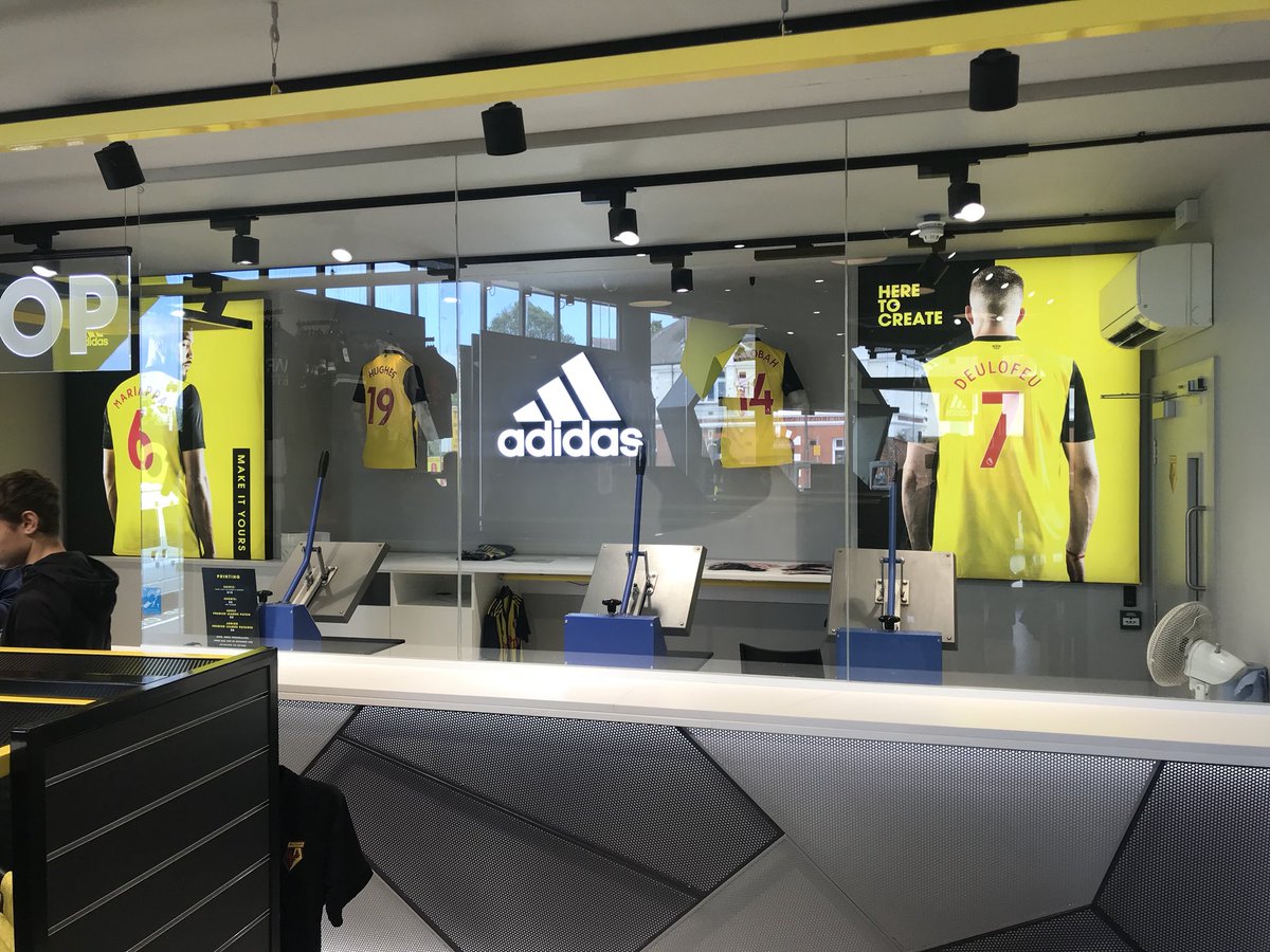 Printed light box fabrics, printed wallpaper and PVC banners all fitted this morning before opening #signs #graphics #watfordfc
