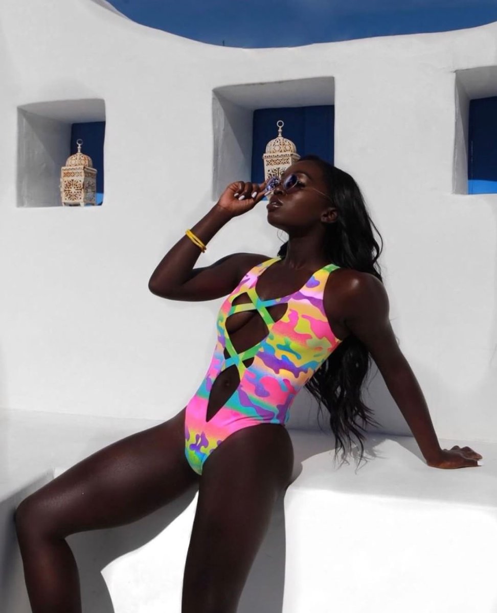 Our KE babe soaking up the sun in our Rainbow Camo One Piece 😍💚💖 Get the look now at klosetenvy.com