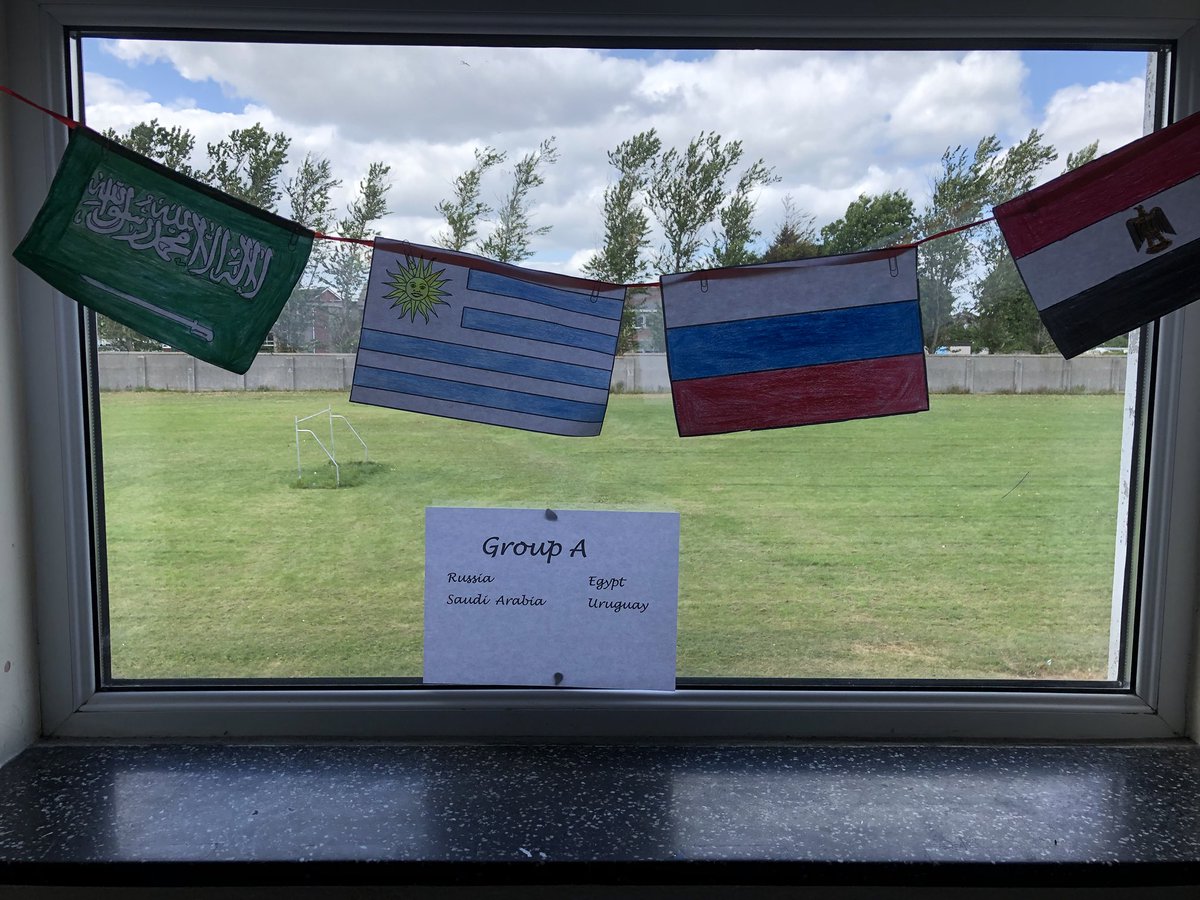 missgillsclass's tweet photo. More football... we are all set for the World Cup kick off. Our bunting is hanging along the corridor https://t.co/YUtfR9hSOV