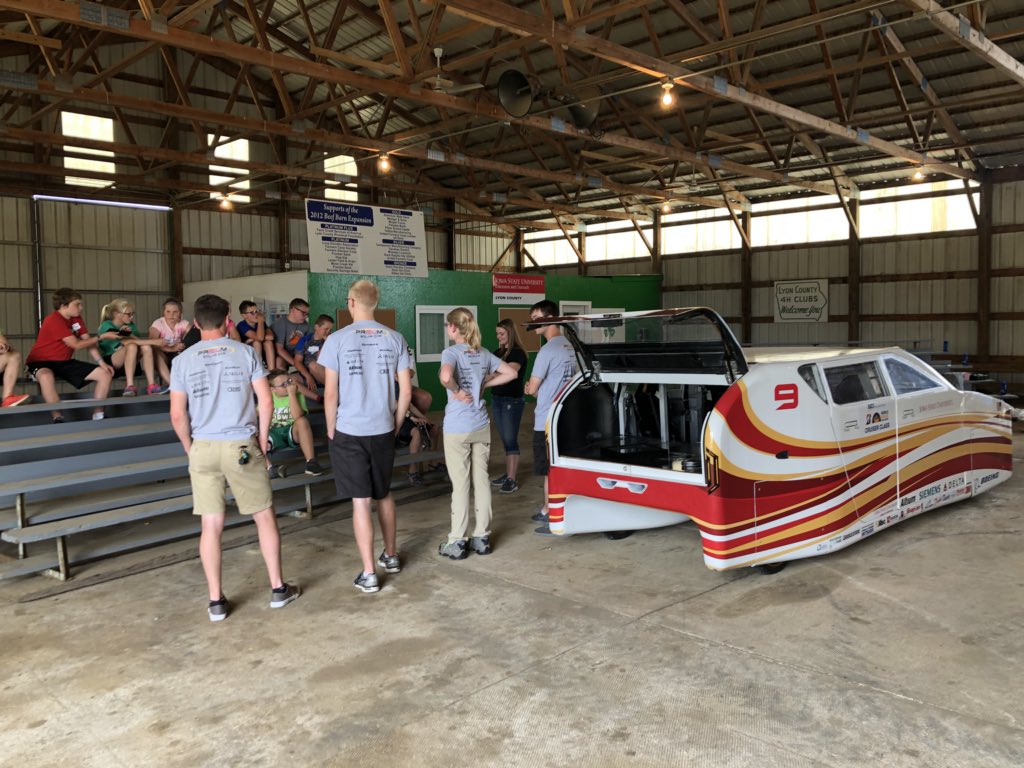 ISUExtLyon's tweet photo. The @PrISUm_Solar stopped by our Lyon County Fairgrounds yesterday afternoon! Named Penumbra, this is the world’s first solar utility vehicle.
Inspiring and awesome for youth to get to see it firsthand! #SunRun99 https://t.co/q80QMa2ud3