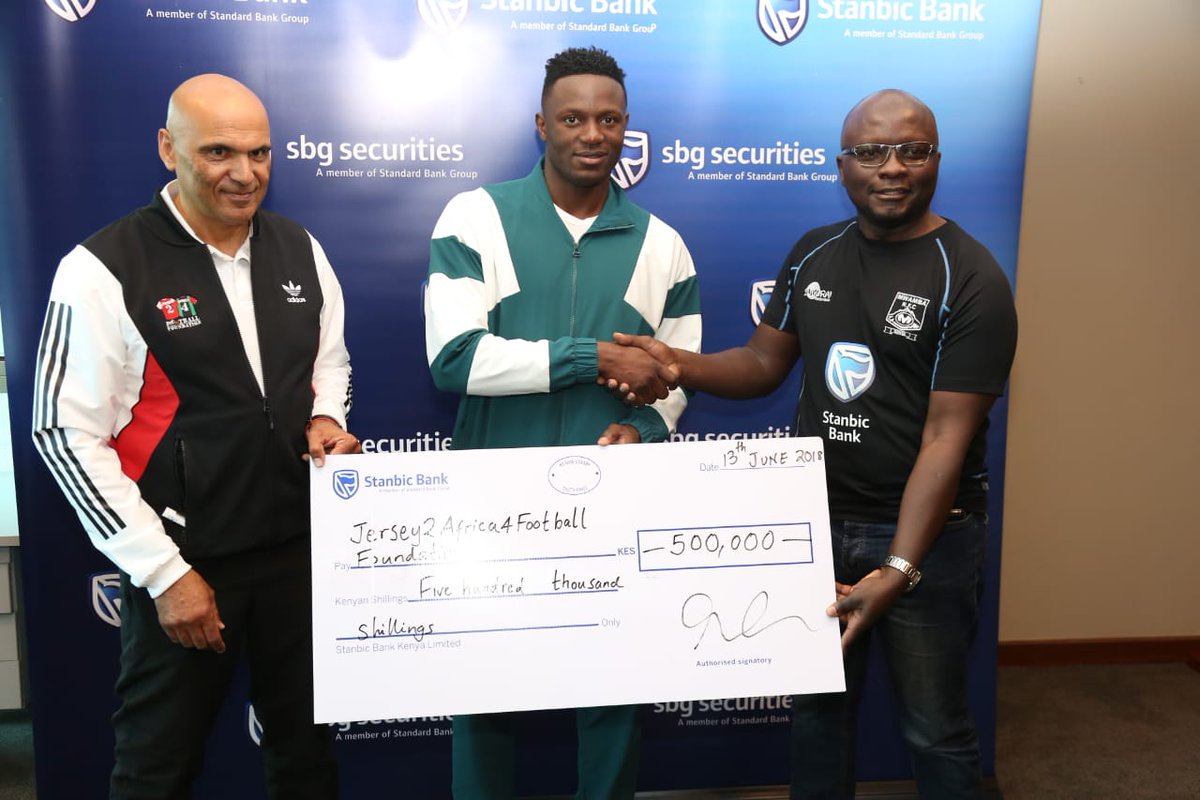 StanbicKE's tweet photo. Today @StanbicKe Communications Manager @WillisAngira presented a Ksh. 500,000 cheque to @j2a4football ambassador @VictorWanyama  #MovingForward https://t.co/BGKu2eb7kH