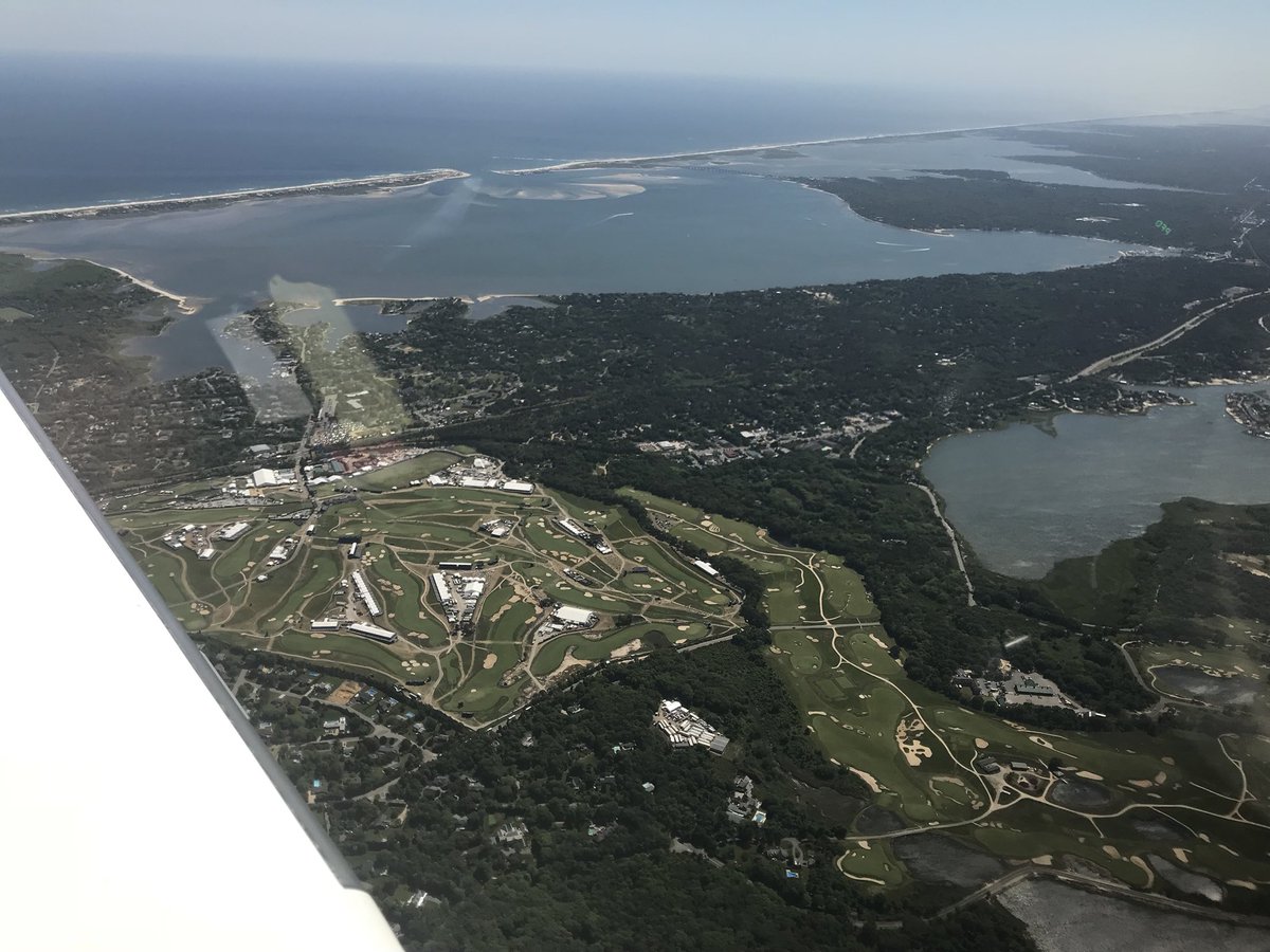 Quick trip up to Boston for work lunch meeting. On way back flew over @shinnecockhillsgolfclub <a href="/usga/">USGA</a> <a href="/usopengolf/">U.S. Open</a> and snapped some pics.  #usopen2018 #usga #golf #shinnecockhills #flying #pilot #pilotlife #cockpitview #cirrussr22 <a href="/cirrusaircraft/">Cirrus Aircraft</a> #aviation #wingphoto