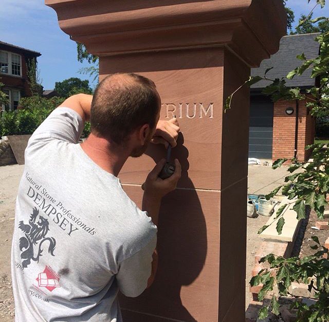 Dempseypaving's tweet photo. Finishing touches to these new sandstone pillars #handcarved #housename #traditionalskills https://t.co/vMOEkD0mED