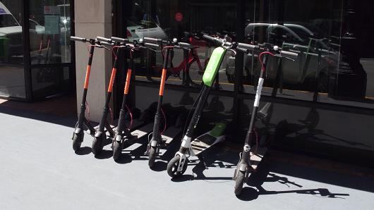 CNBC's tweet photo. Are scooters the future of transportation? Investors are thrilled to get their hands on this fledgling market led by scooter companies like Lime and Bird, who are currently being valued over $1 billion. https://t.co/nMXiiFf6OY https://t.co/E6lLs5rAhr
