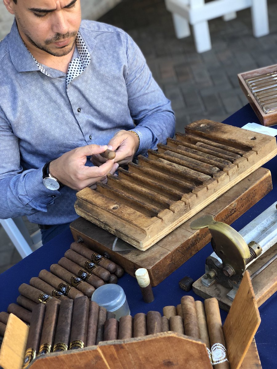 Hand rolling the Cuban Cigars