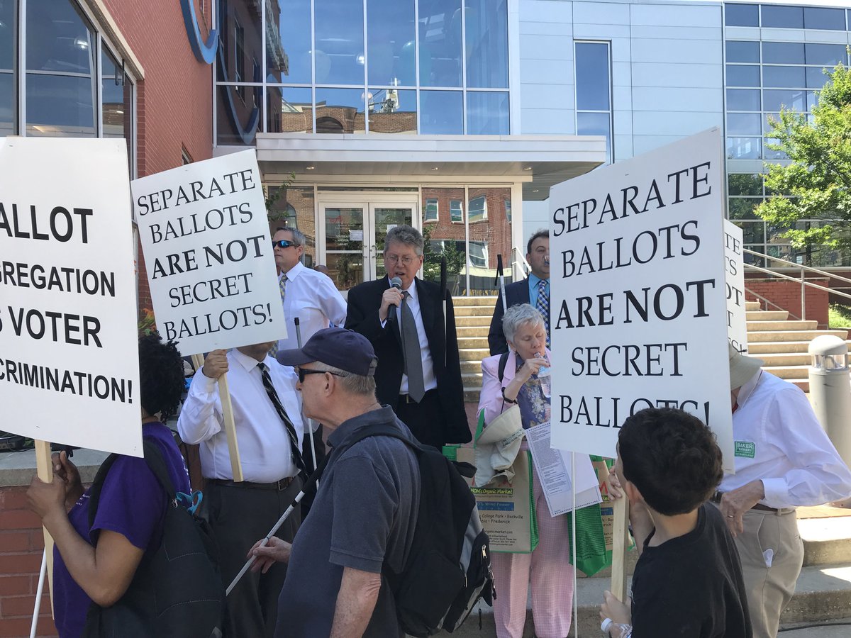 johngpare's tweet photo. Photo of @NFBMD protesting the use of segregated ballots. Separate is not equal! This must end now! https://t.co/eoDFKY2AEG