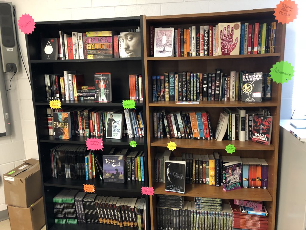 MrMidford's tweet photo. Had my #cotewsd1 ELA students working hard before exam week begins. Organizing, labeling, and categorizing classroom books. #literacy #genrification https://t.co/auSRNBGvJl