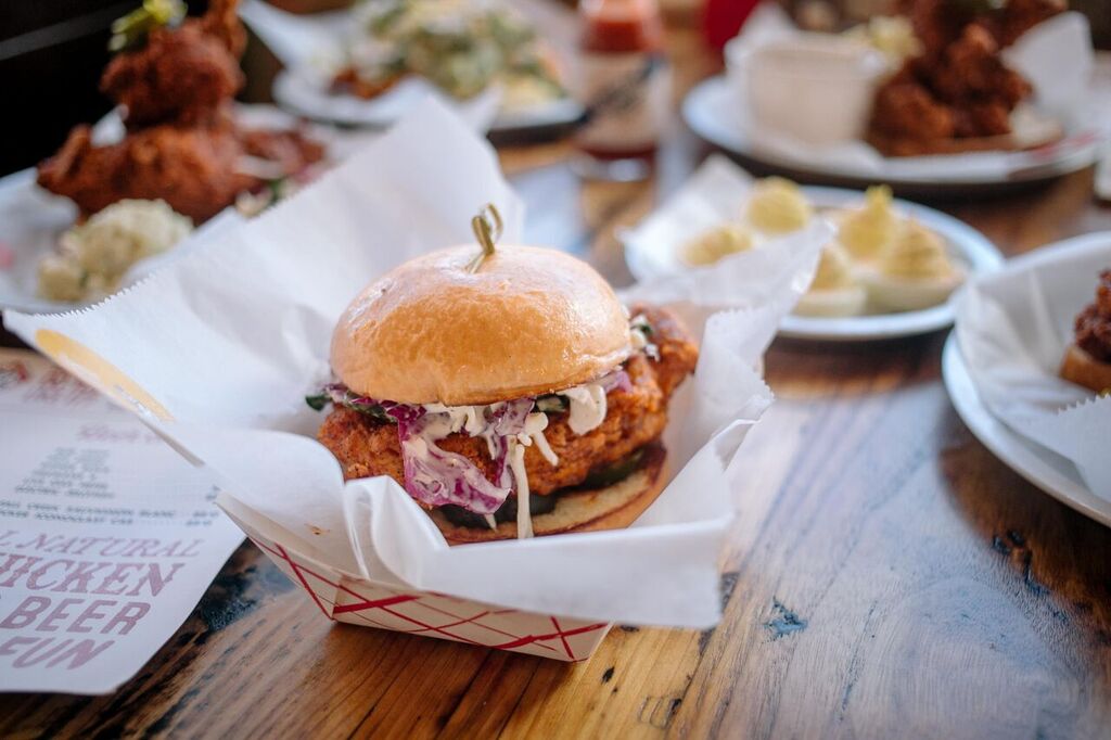 Indulge in our flamin’ hot chicken from home! Just go to tumble22.com, order all the chicken, sides + pies your heart desires and swing by to pick it up.