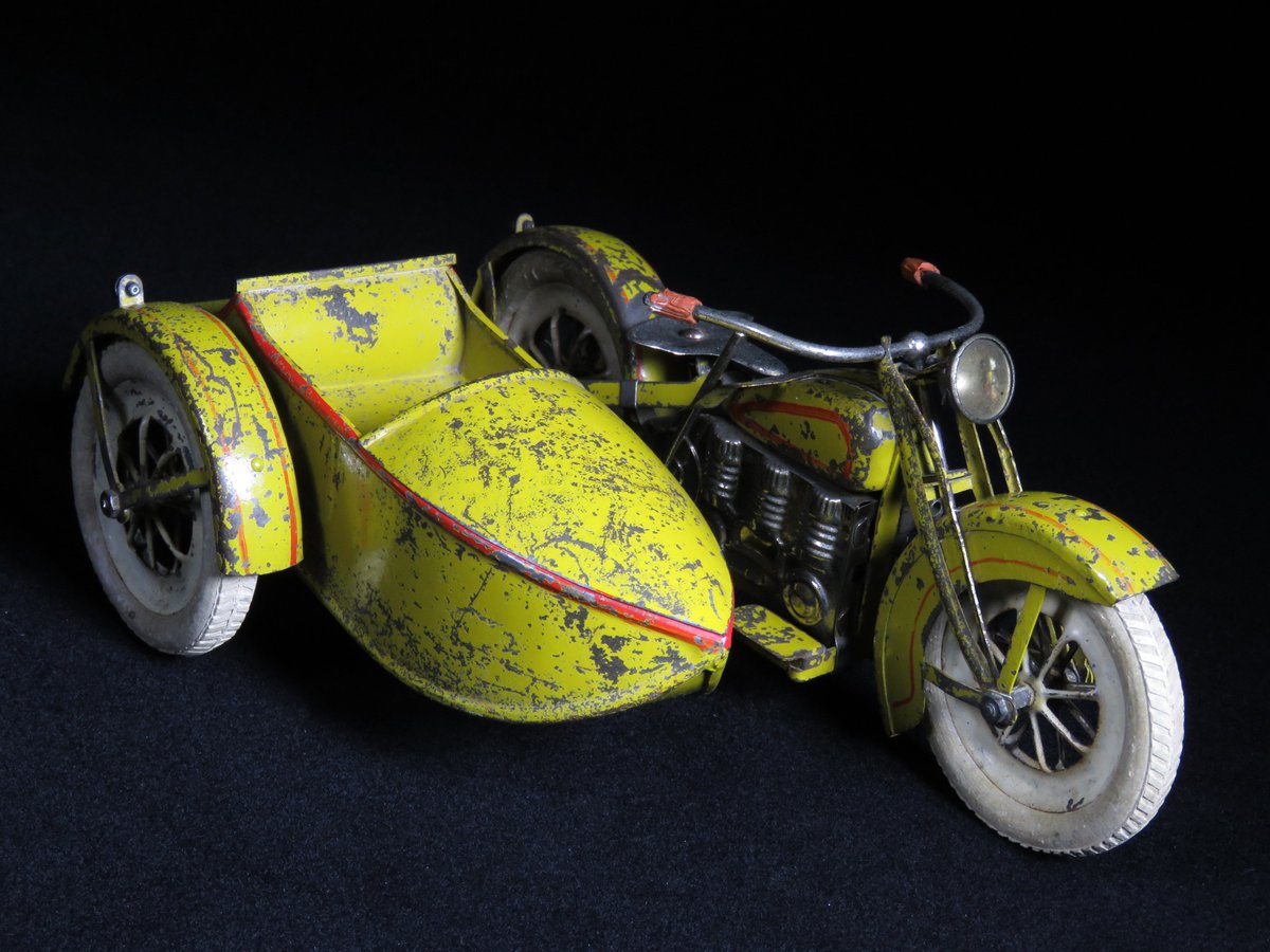 mark_toys's tweet photo. MB Toys - FOR SALE - This mechanical wind-up vintage tin Motorcycle &amp; Sidecar is all original. Tin engine is stamped with realistic engine motor, classic large solo seat, headlamp, tail lights, wheels, and Harley Davidson style! The patina adds to the character of this bike. https://t.co/IDKxYpTF56