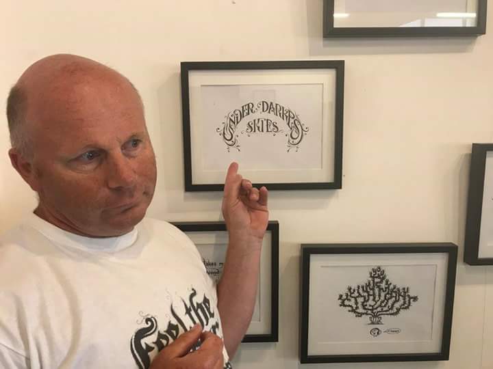 DarkestUnder's tweet photo. Pics from @CSzpajdel art gallery show from yesterday - our logo on display in an art gallery! #UnderDarkestSkies #Metal #MetalMusic @MetalNewz @metalinjection @metalsucks https://t.co/oWSi6WsaX8