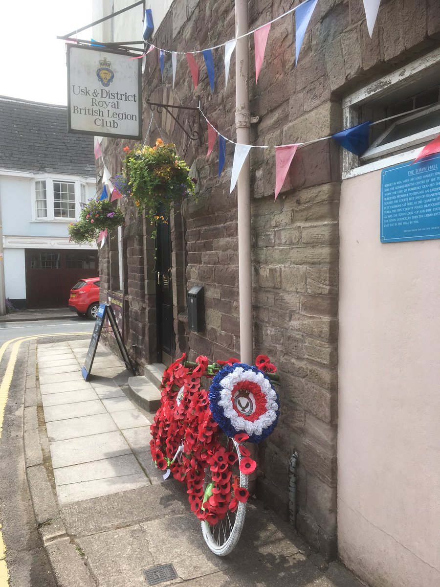 UskTownCouncil's tweet photo. Good to see some Usk Businesses taking part in the Bike Off. The Usk Royal British Legion Club have gone for a poppy themed bike again.Very apt with the centenary commemorations for end WW1 this year. Velothon #cycleusk #velothonwales #velothon https://t.co/5UwMxp64P9