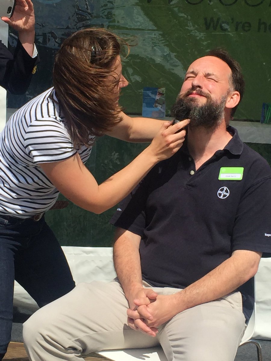 NorrisCarol4's tweet photo. Beardoff in action at #Cereals2018 yesterday. Adam getting “de-tramped” by his wife Sarah, in aid of @3PlotsChallenge and the Rob Stephenson Trust. @Bayer4CropsUK @Invigorosr_uk https://t.co/BRZbq7DEsK
