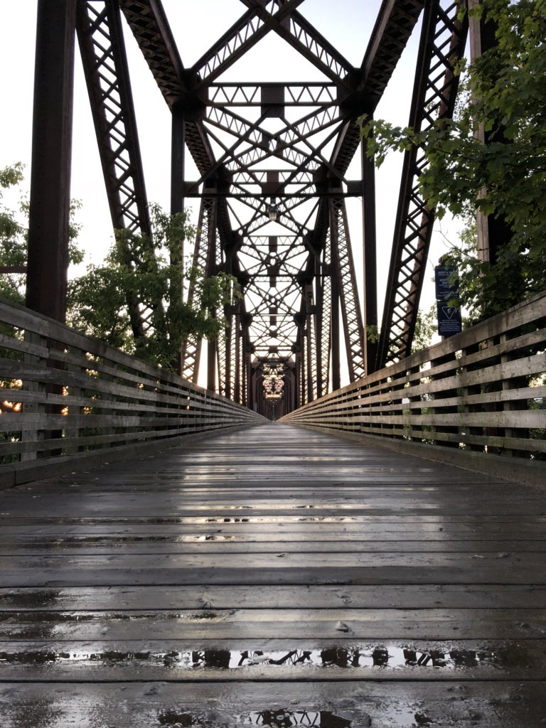 Morning runs are a fantastic way to explore new cities before the busy conference day kicks off. Seen here, the Bill Thorpe Walking Bridge is a former railway bridge now part of an extensive trail network that runs throughout Fredericton. <a href="/CSCE2018/">CSCE 2018</a>