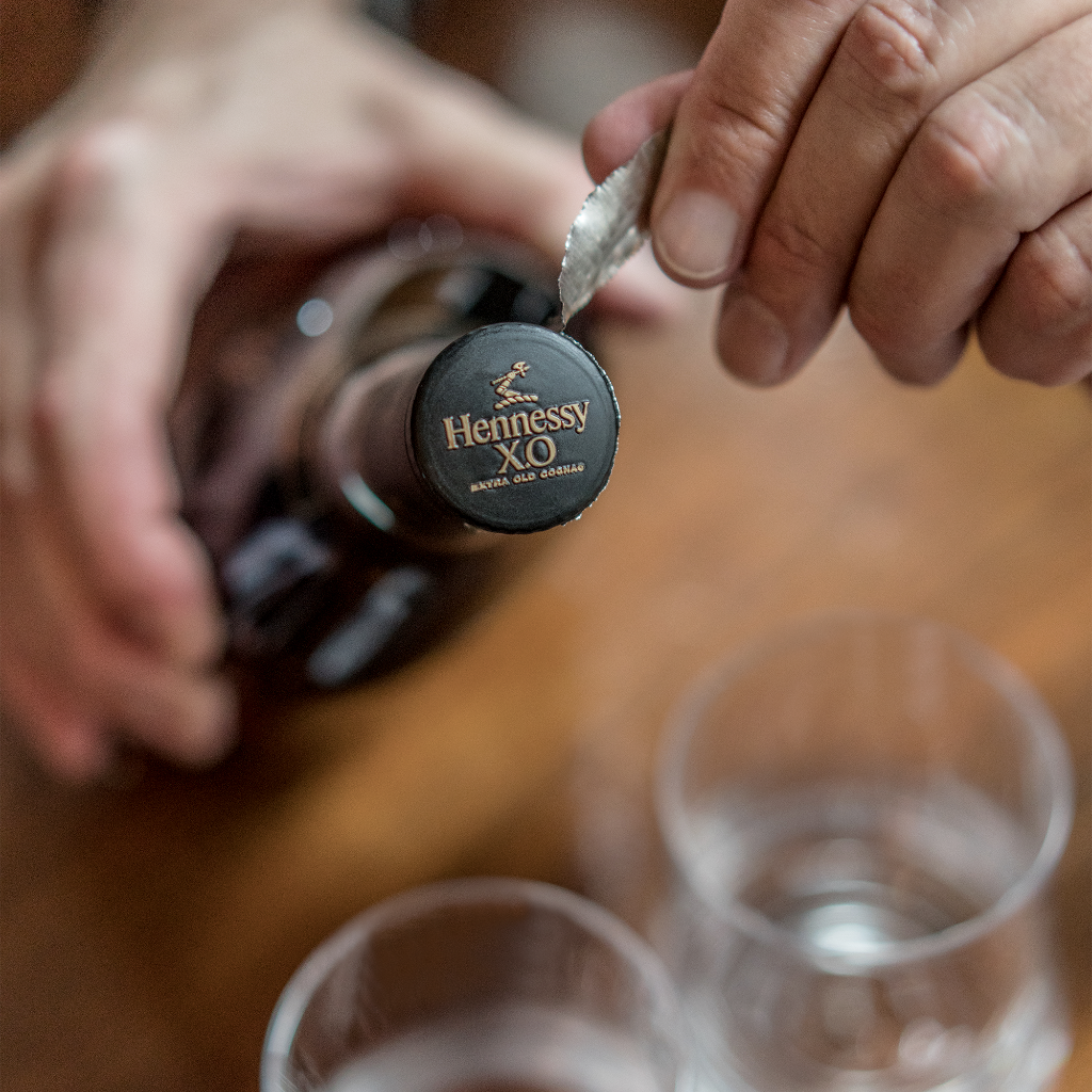Hennessy's tweet photo. Raising a special toast to fathers, father figures, and everyone in between. Celebrate #FathersDay with Hennessy X.O. https://t.co/XoZrWupHIP