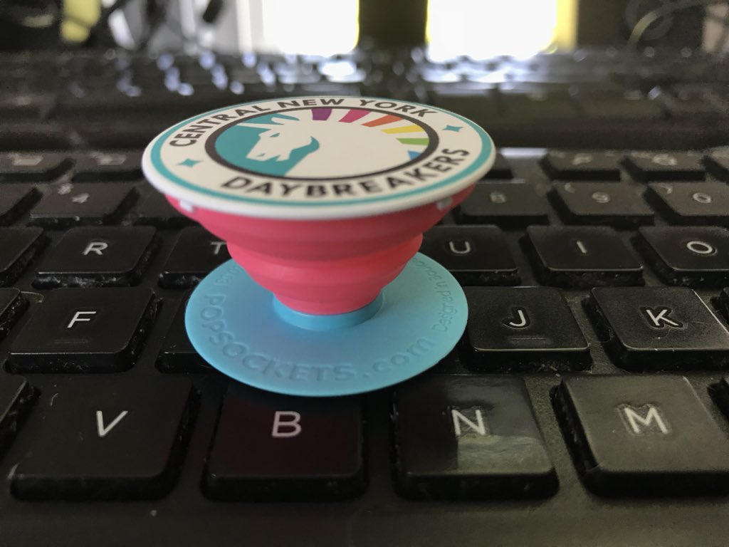 lindseycore's tweet photo. If you don’t have a custom Pop Socket with your team’s logo, are you really even living life? #CNYRD #daybreakers #wheelsofteal https://t.co/V7q3VL3eMe