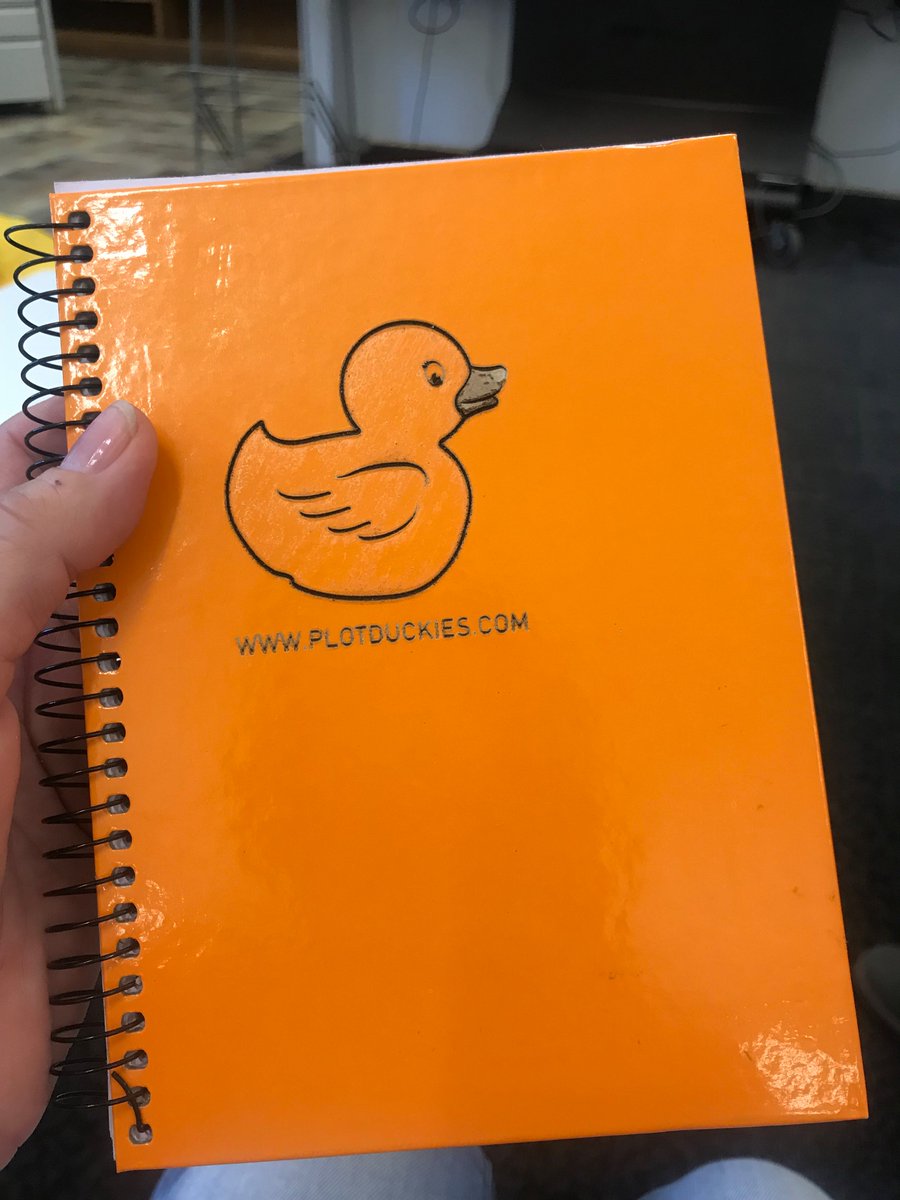PlotDuckies's tweet photo. One of my event sponsors, Holly of @Ornatelier, brought sample notebooks with the duckie logo. Soooo cute! ❤️ 
Ornatelier makes beautiful, handmade pens &amp; other awesome product. Follow her &amp; keep an eye out for her next event so you can nab a one of a kind pen! #writerlythings https://t.co/rwFdNNnngB