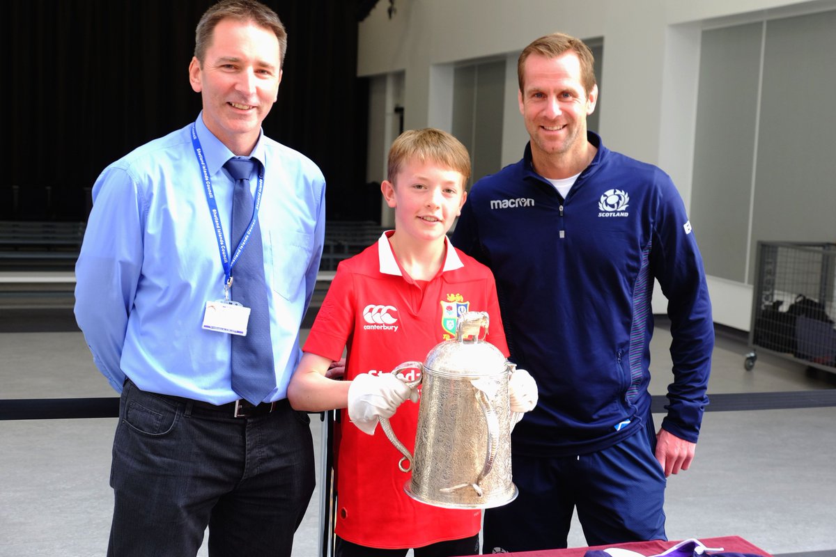 ShetIslandsCll's tweet photo. The #CalcuttaCup is here! π Staff and pupils at Anderson High School enjoy a moment at lunchtime today with the famous cup and #rugbylegend Chris Paterson. Thanks to @Scotlandteam for sharing both of them with us πͺππ#AsOne #rugby #Shetland #NewAndHS #SICSchools https://t.co/N29Q90fDVq