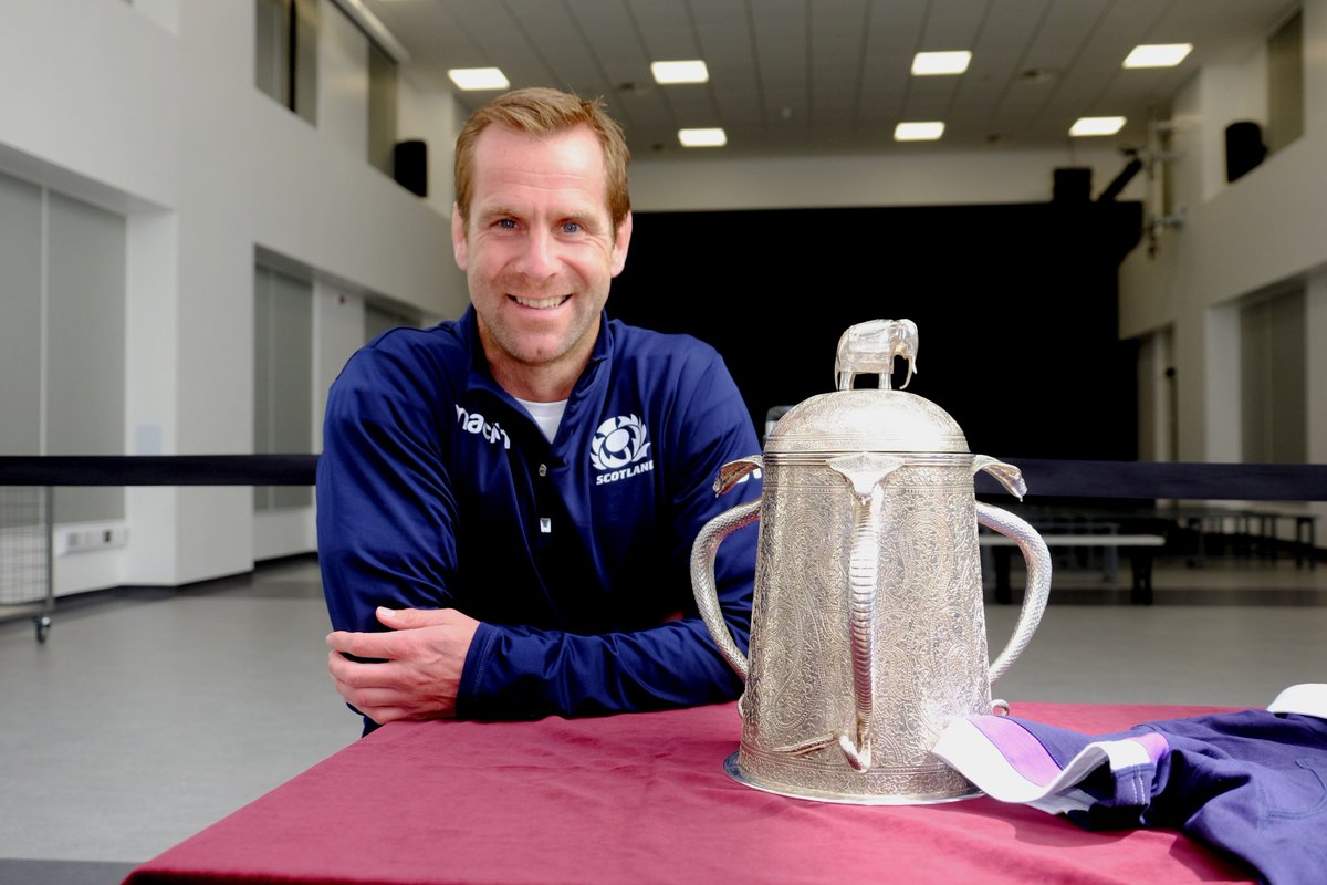 ShetIslandsCll's tweet photo. The #CalcuttaCup is here! π Staff and pupils at Anderson High School enjoy a moment at lunchtime today with the famous cup and #rugbylegend Chris Paterson. Thanks to @Scotlandteam for sharing both of them with us πͺππ#AsOne #rugby #Shetland #NewAndHS #SICSchools https://t.co/N29Q90fDVq
