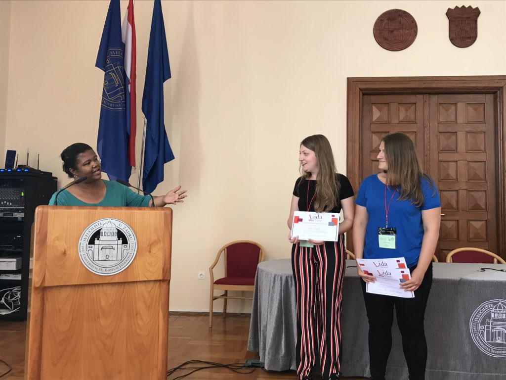 LIDADubrovnik21's tweet photo. @LibraryNicole presents the student showcase award to “The role of Osijek Public Library in Modern Society: With Special Consideration of it’s Physical Accessibility” #LIDA2018 https://t.co/IuTDQoTgff