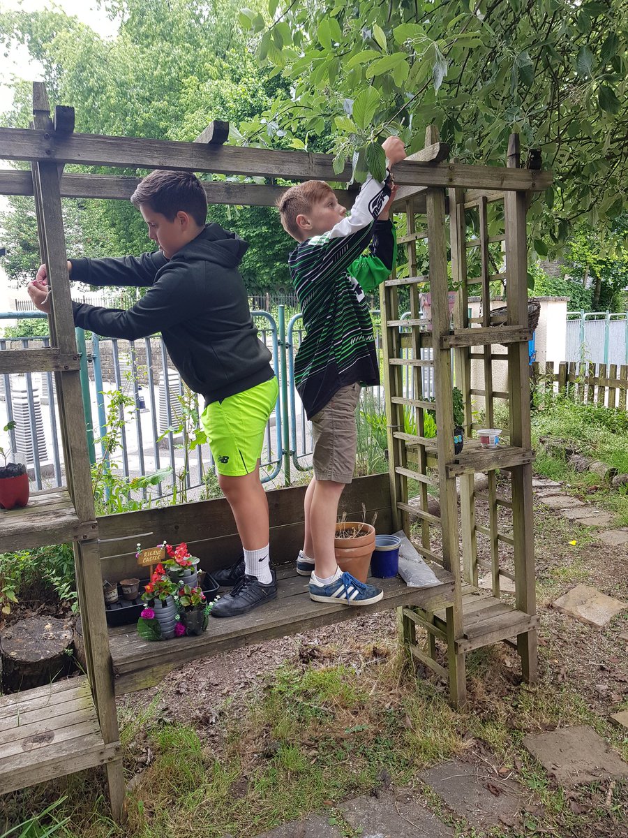 marys_rc's tweet photo. Eco Committee chairperson and vice chairperson have fun hanging the birds tasty treats around our gardens! #biodiversity #gogreenday #gogreenmonth https://t.co/vvUONx3FJ6