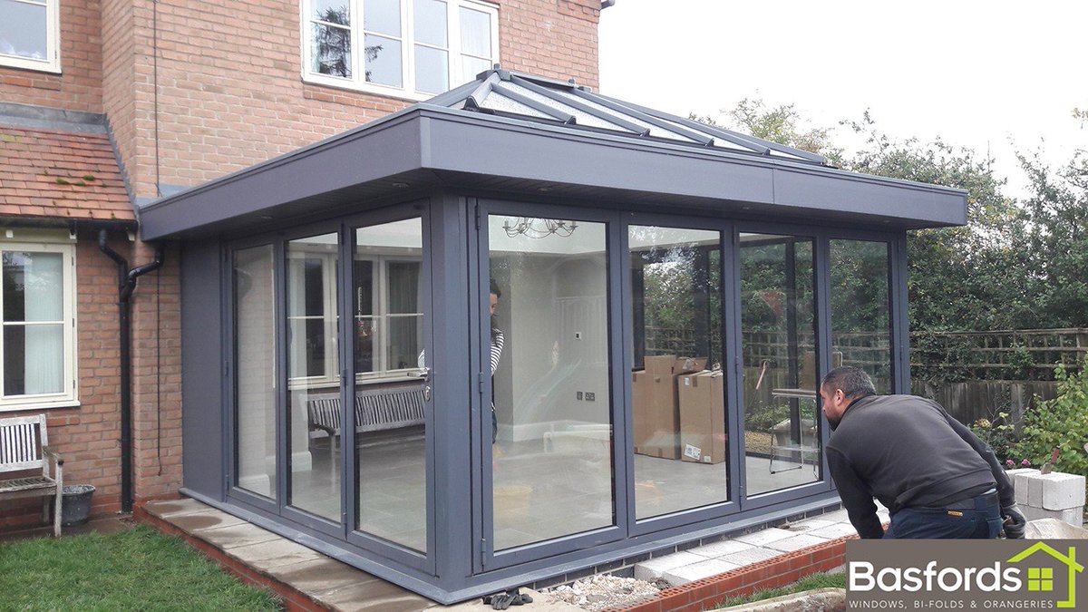 This orangery was fitted with two sets of <a href="/Originbifolds/">Origin Global</a> with a three pane bi fold door on the left wall and then a four pane bi fold door located on the face of the orangery, a truly unique design #orangery #origin #originbifolds #bifolds #basfordseffect