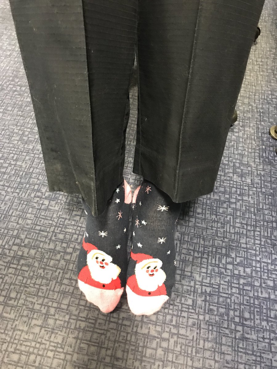 JojoLALD's tweet photo. Sooooo I packed the wrong socks for work today!!! #Whoops #ItsAlwaysChristmasInJojosWorld #SantaForever #UnicornSocksTomorrow @VWStaffDave https://t.co/2QavmLTUn6