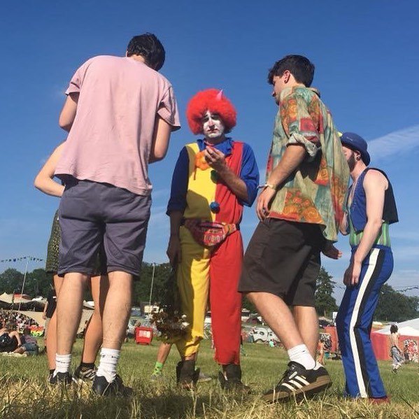 FieldMagUK's tweet photo. We found this down trodden clown being berated by his evil clown friend. We hope he’s since found happiness... 😔🤡 #photooftheday #festival #clown #sunny #funinthesun https://t.co/C8KYFUHnwS https://t.co/OUOnNeIFcV