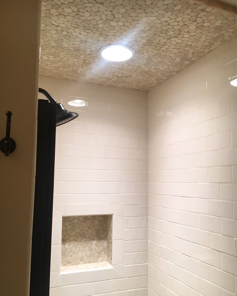 TileSensations's tweet photo. We are in love with Anne’s bathroom! Check out the travertine on the floors and a beautiful pebble mosaic in the shower! #tile #tilesensations #travertine #pebble #mosaic #funtile #natureinspired #resisttheordinary #girlboss #funtilefriday https://t.co/RTVZWZ9eR4