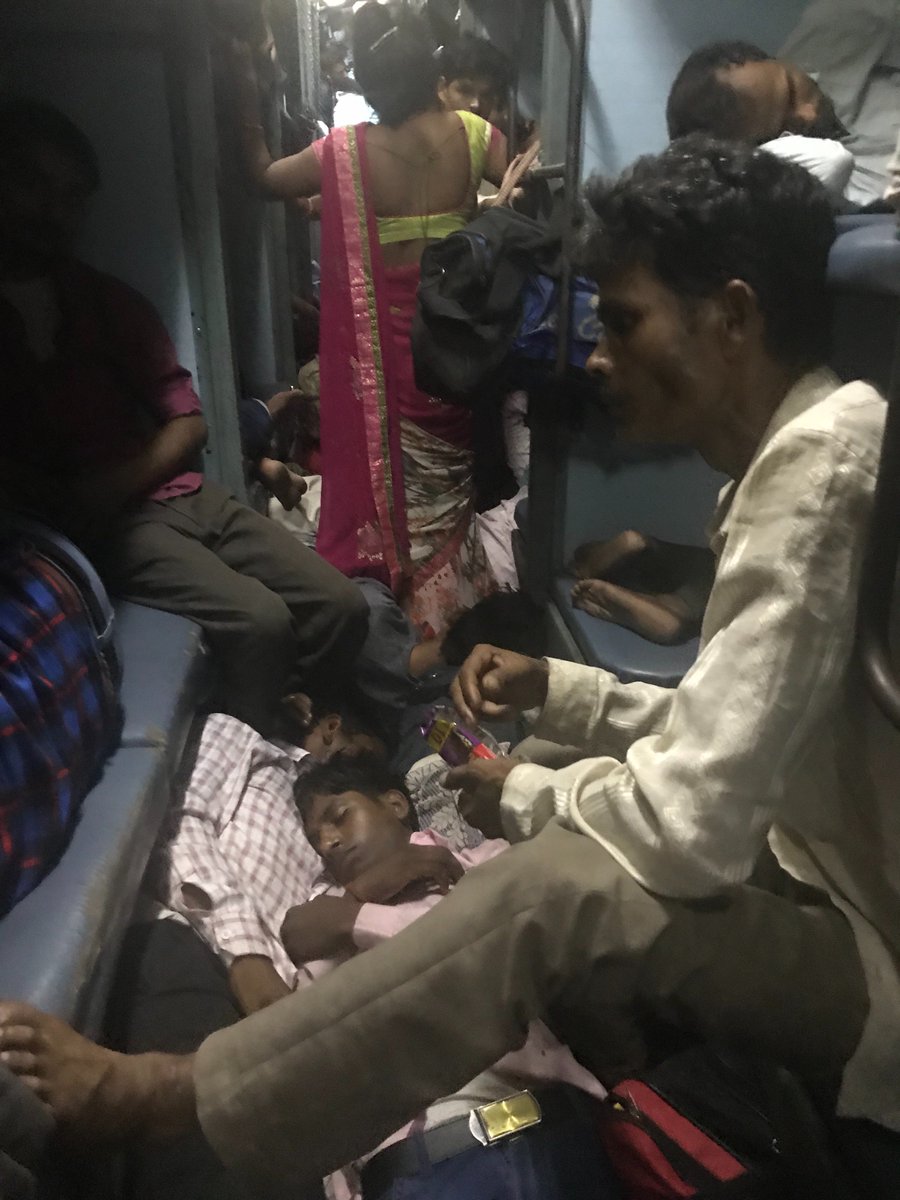sangInIshah's tweet photo. The SUPER SAD SITUATION of Indian Railways! My last minute changes made me take a SL ticket and look @ this! I could barely make it to the door! &amp; mind u this is just one side - the opposite side was even worse! @RailMinIndia wat r u  doing about this? #Disgusted #IndianRailways https://t.co/1NjRDr7Boo