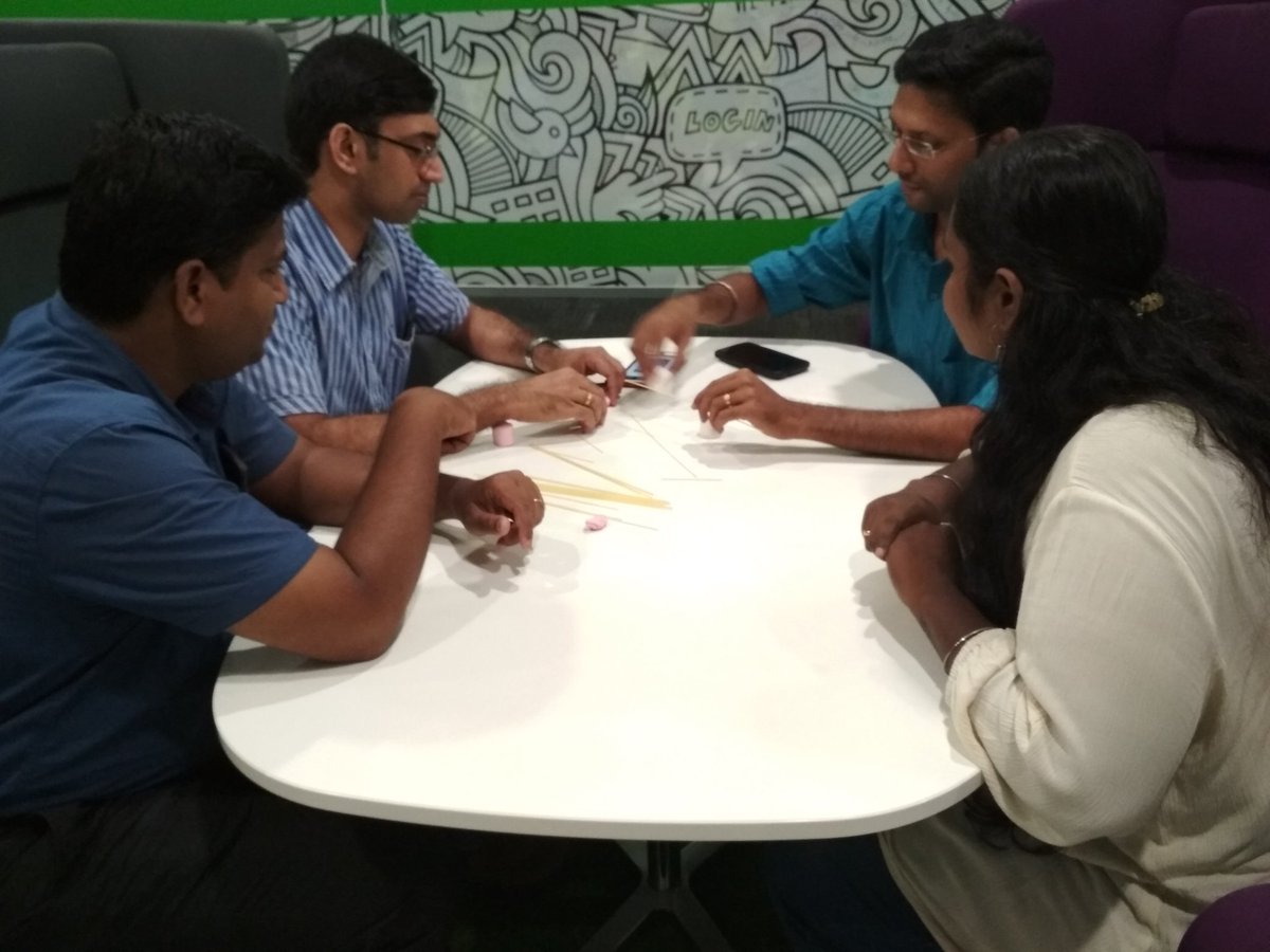 charstacker's tweet photo. Teams discussing about Spaghetti-Marshmallow Challenge.
#SocgenMeetup #skillenza https://t.co/SSfzRc6UhA