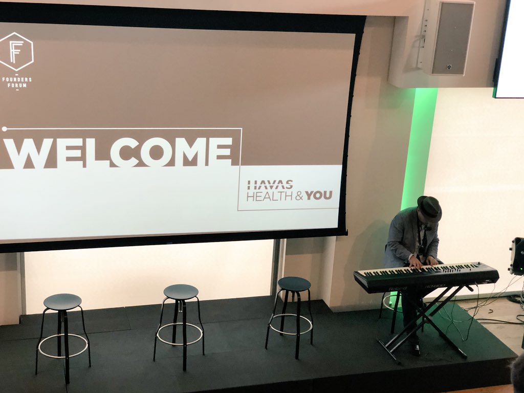 V_Bainton's tweet photo. The one and only @MatthewZachary performs and explains why his #braincancer survival story -> founding @StupidCancer #lynxlife #switchedon #endcancer #FFhealthTech #AYA #cancer #thankyou #dignityandchoice https://t.co/c2Bsd1XMYG