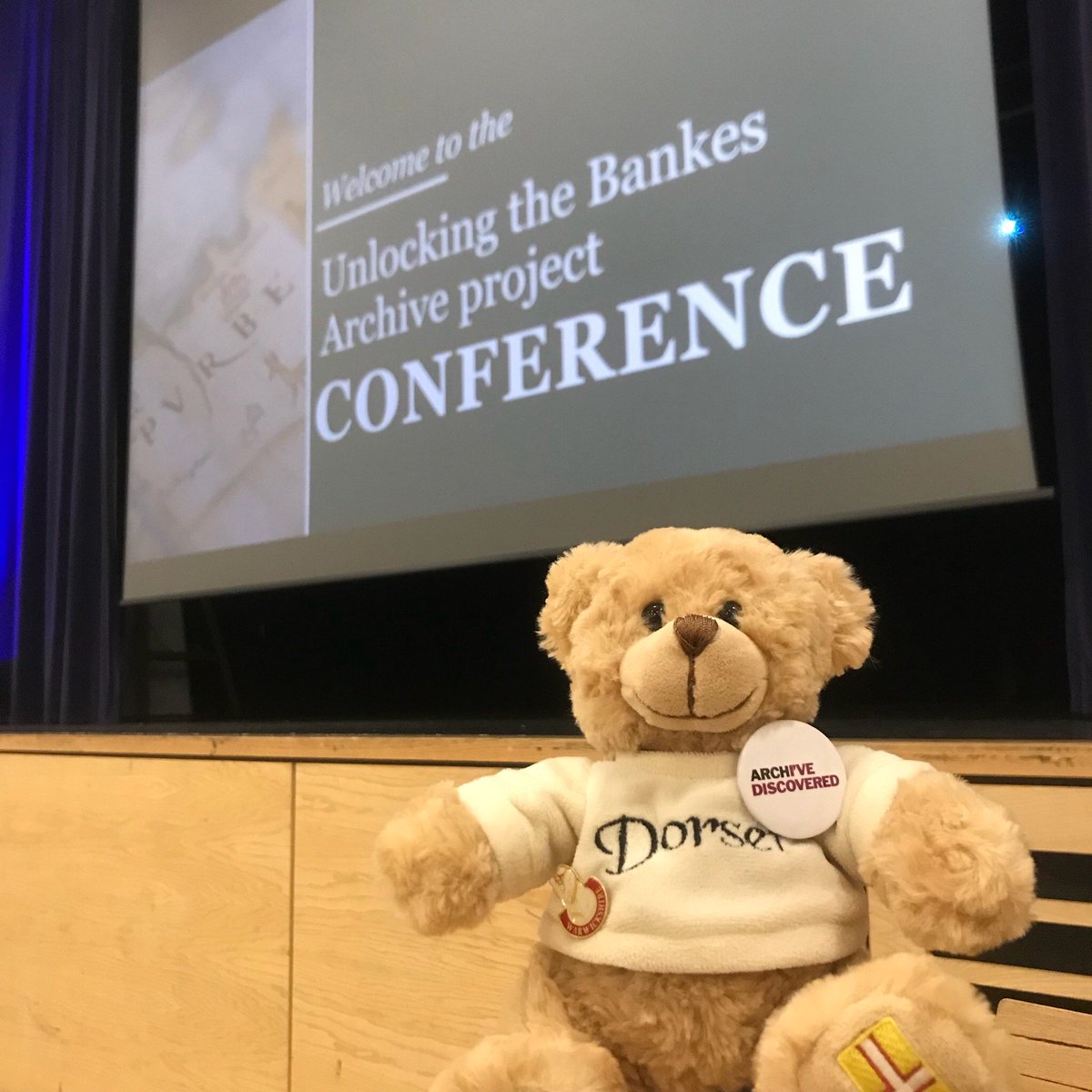 DorsetArchives's tweet photo. Good morning! #archivebear Regis is ready at @QESDorset For the Unlocking the Bankes Archive project conference! We will be live-tweeting the event throughout the day, join in with the #UnlockingBankes hashtag π https://t.co/4QgQvoOjJ5