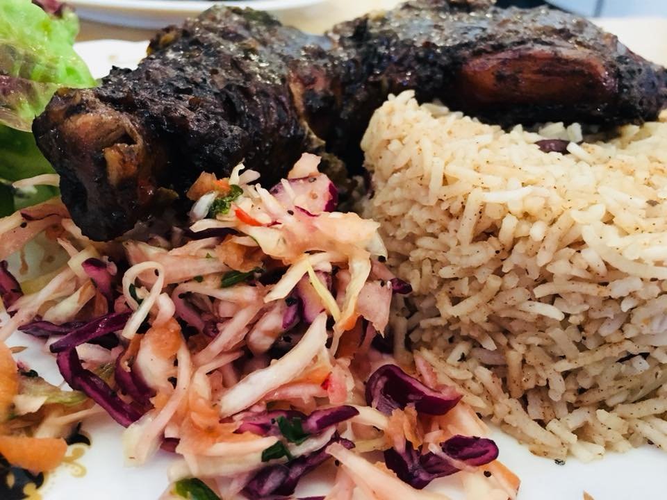 Chef's Special: Creole style jerk chicken, rice and peas, Creoleslaw. We're open from midday!