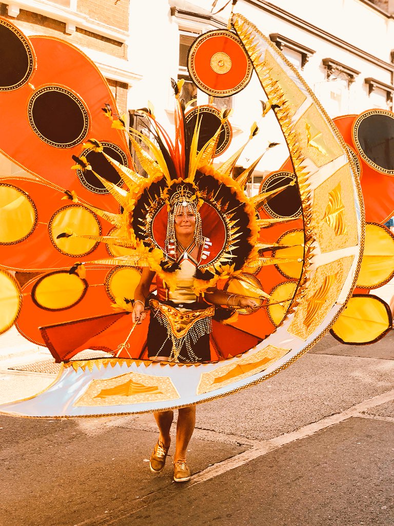 HENLEYDARREN's tweet photo. A riot of colour, music and dance in the sunshine in Ryde on the Isle of Wight today for #IWMardisGras from #ACEsupported @NewCarnivalCo - around a thousand young people taking part in the carnival parade. https://t.co/uIYcWYY4nm